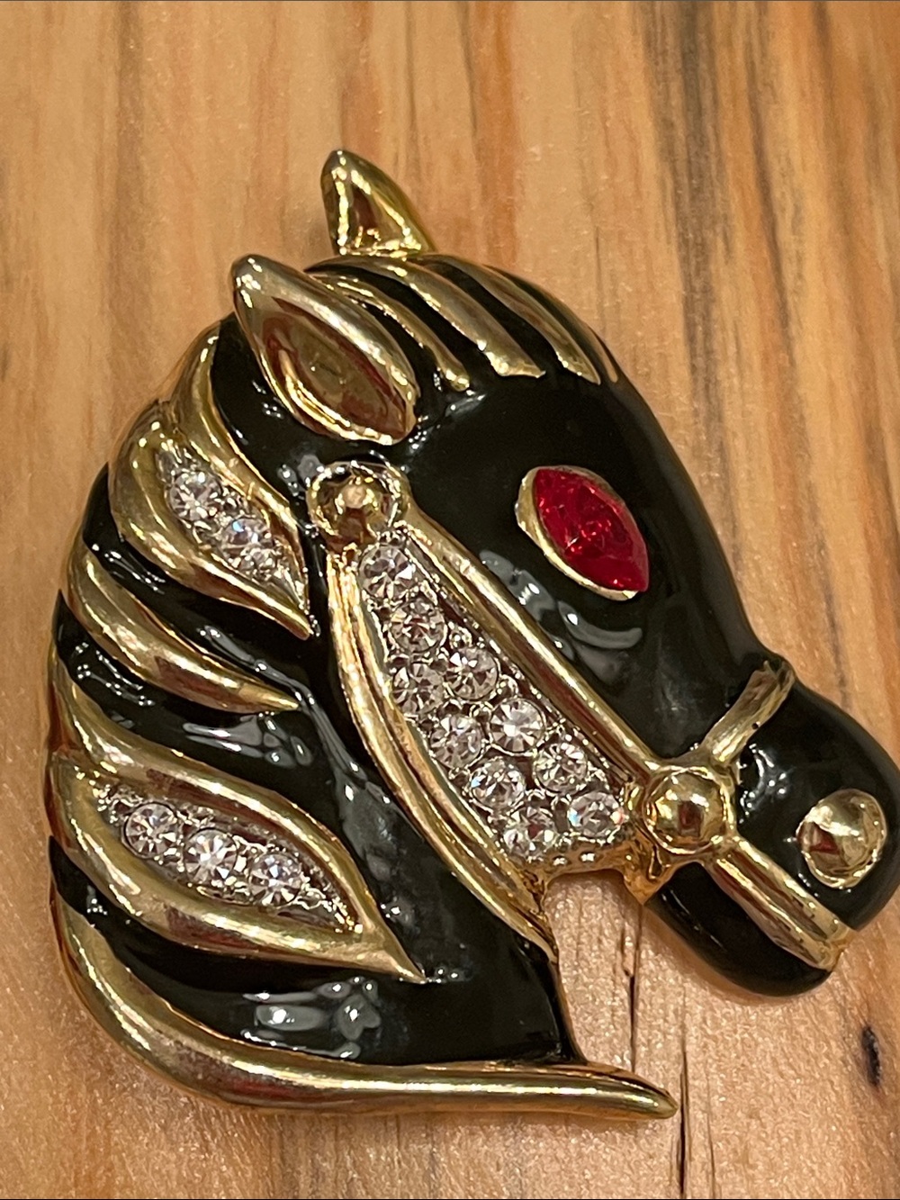 Black and Gold Horse Head Lapel Pin with Red Eye